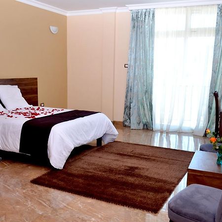 Melodie Hotel Addis Abeba Esterno foto