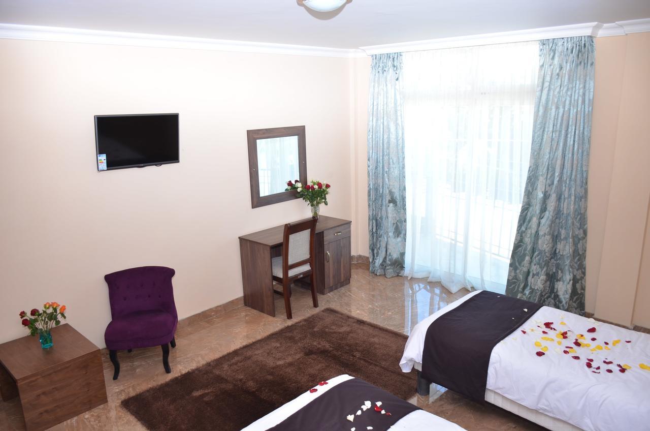 Melodie Hotel Addis Abeba Esterno foto