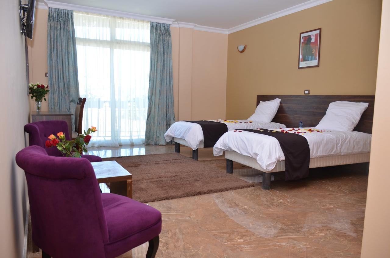Melodie Hotel Addis Abeba Esterno foto