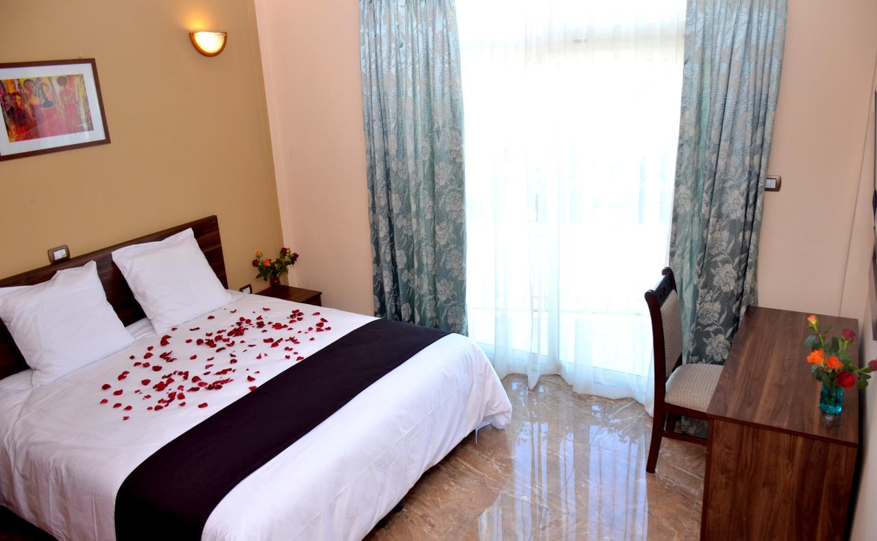 Melodie Hotel Addis Abeba Esterno foto